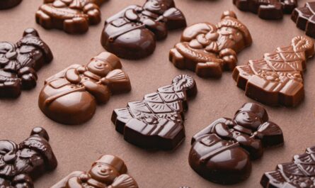 a table topped with lots of chocolate candies